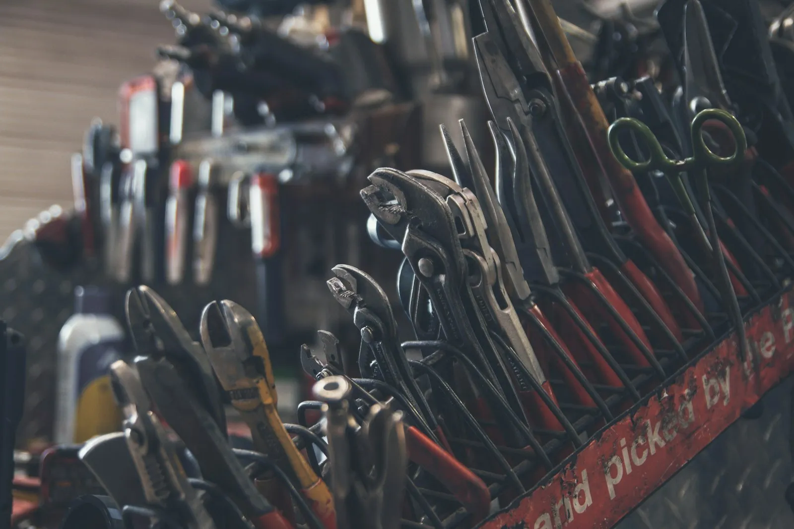 Garage door spring repair tools in Dallas - winding bars, locking pliers and spring sizing tools used by Dallas technicians